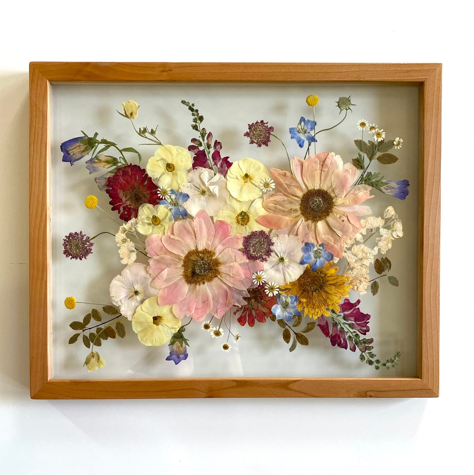 Pressed flowers in a 16x20 natural frame