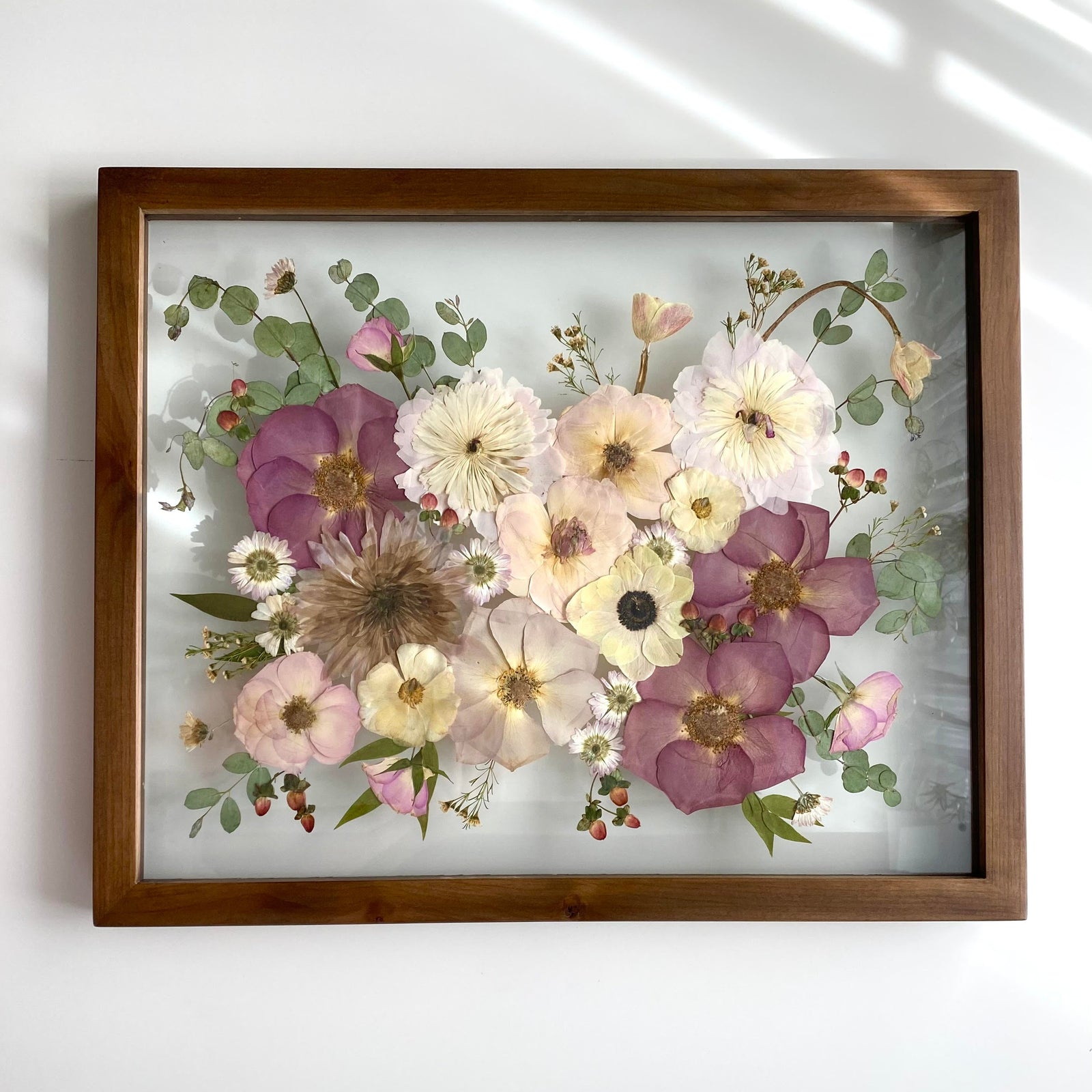 Pressed bridal bouquet in a 16x20 espresso frame